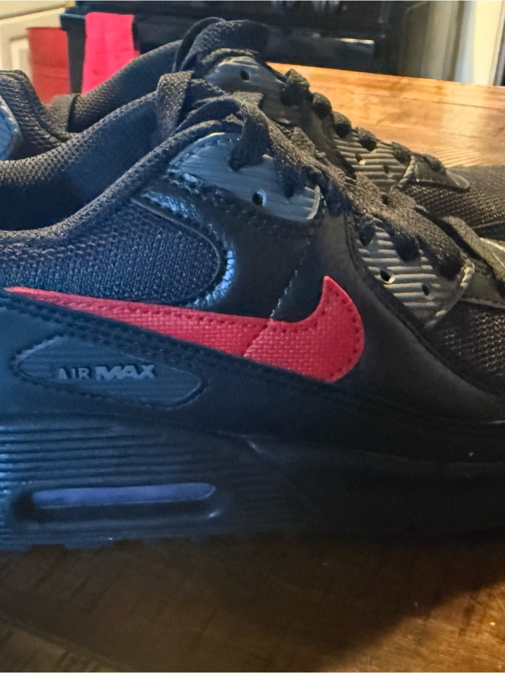 Nike Black Sneakers with Red Swoosh